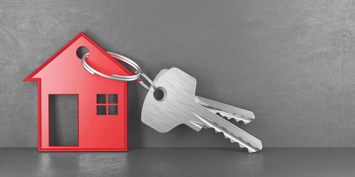 red house with keys attached to it