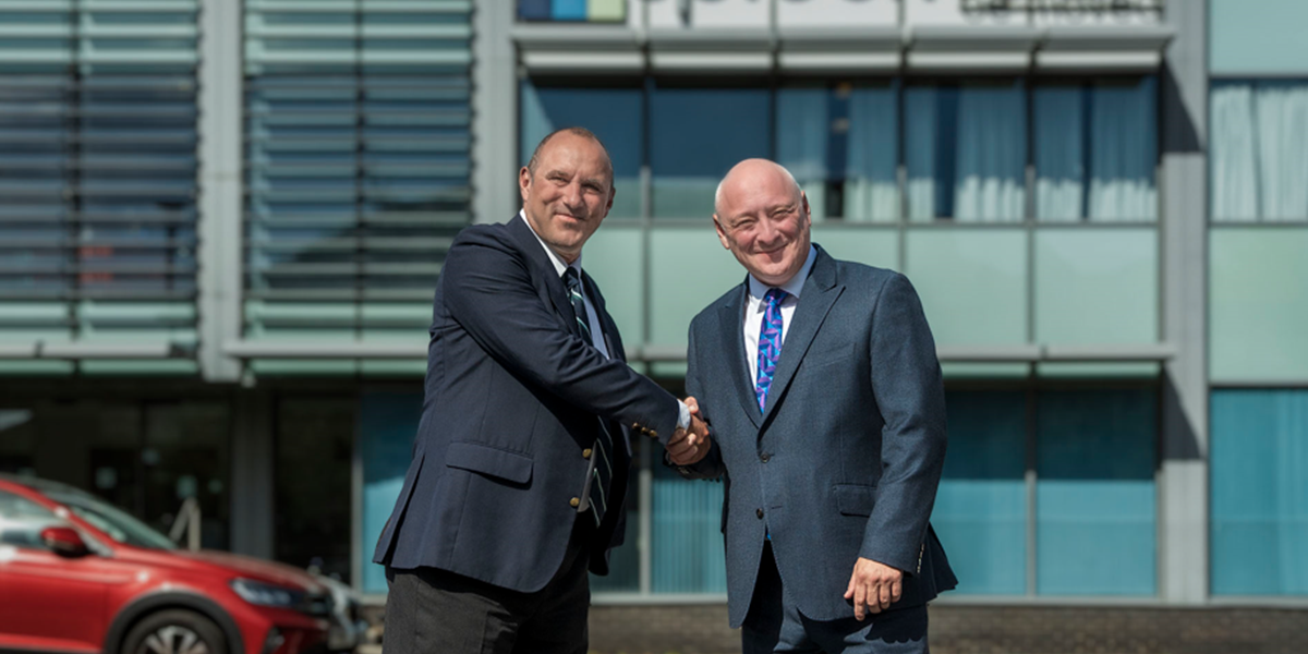 David and Antony stood outside our Head Office